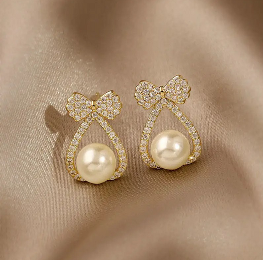 Bow knot pearl drop earrings