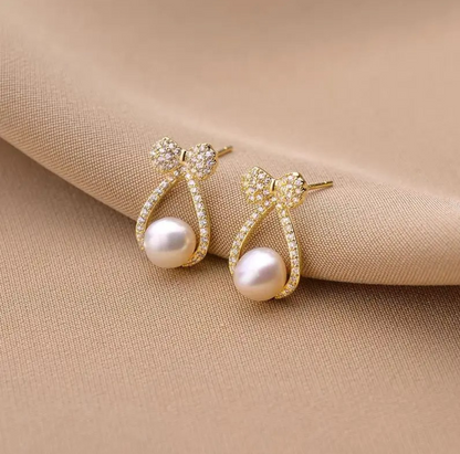 Bow knot pearl drop earrings